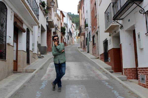 Fran stands in the streets of Agres, Spain