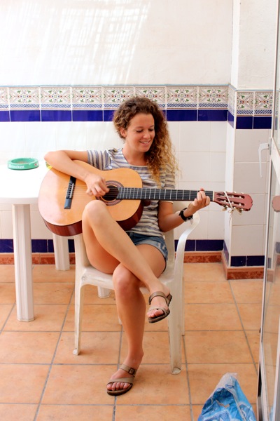 Paloma plays the guitar while we make Spanish gazpacho