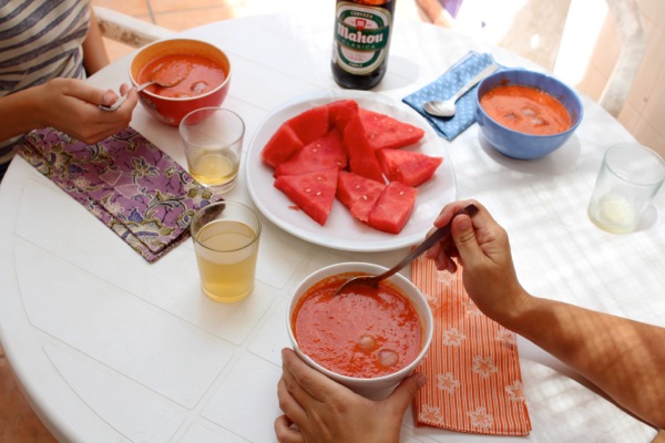 Friends enjoy generous bowls of watermelon gazpacho
