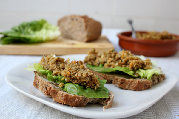 Fresh bread piled high with a vegan sprouted lentil dip