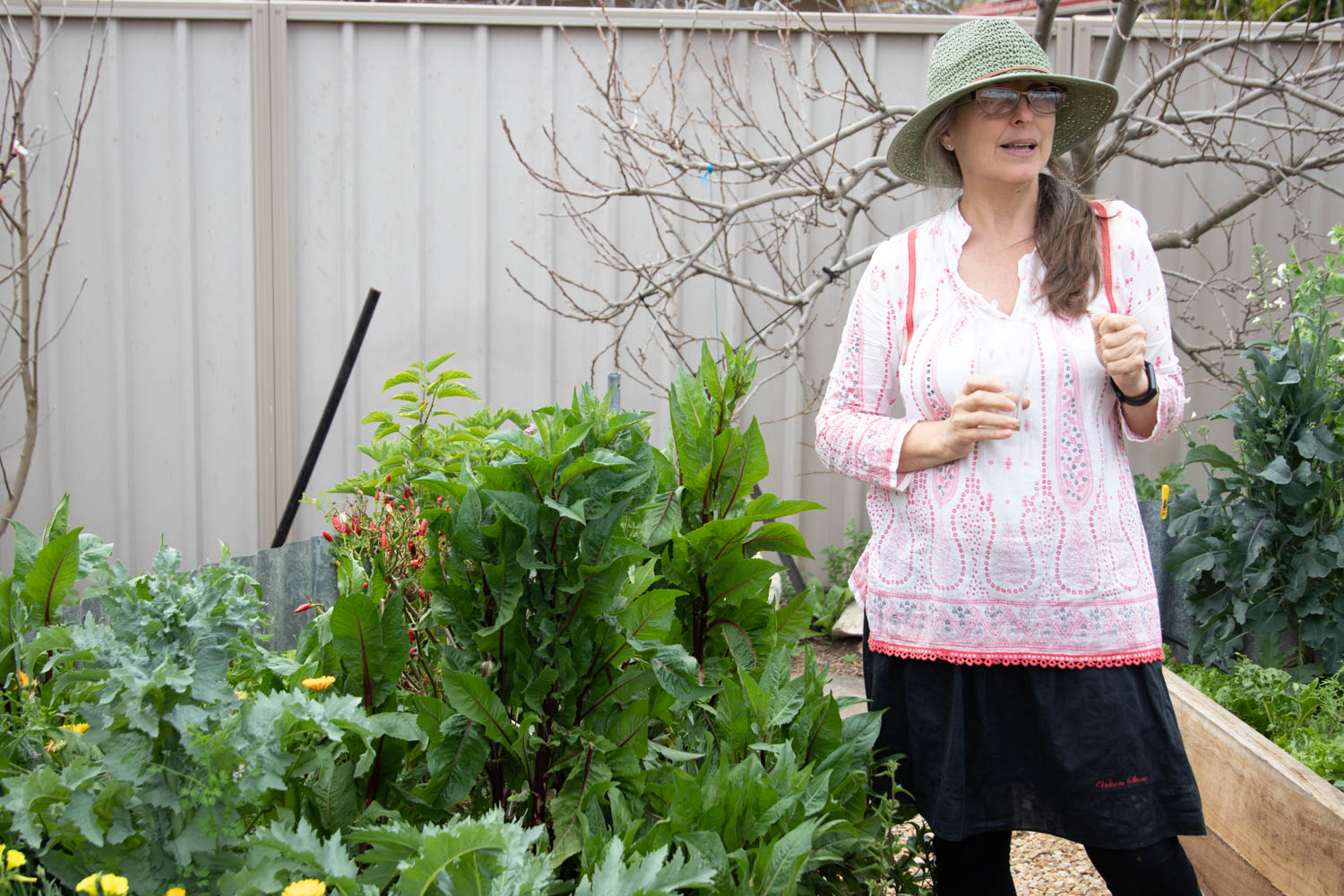 Patrizia in her herb garden.