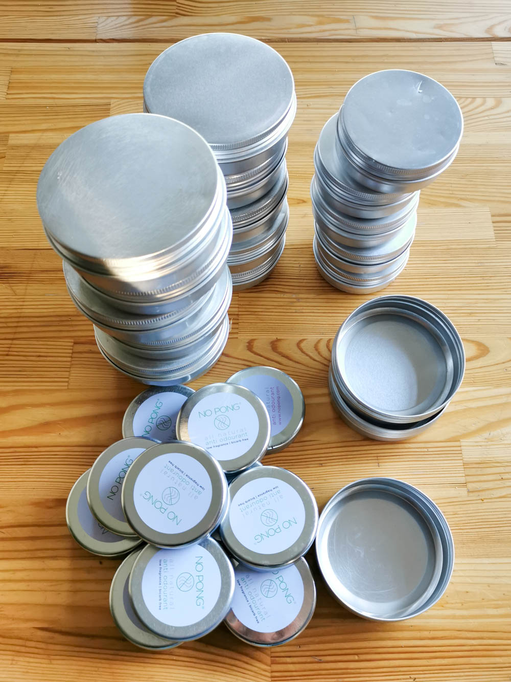 Recycled tins, ready for filling with calendula salve.