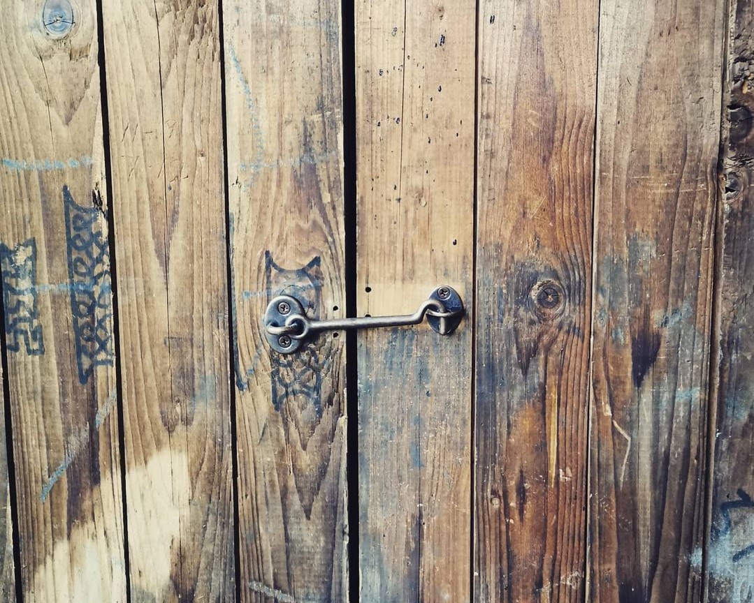 The latch on The Local Yum door.