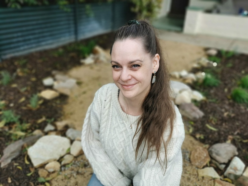 Koren Helbig in her urban garden, a native butterfly garden in her front yard.