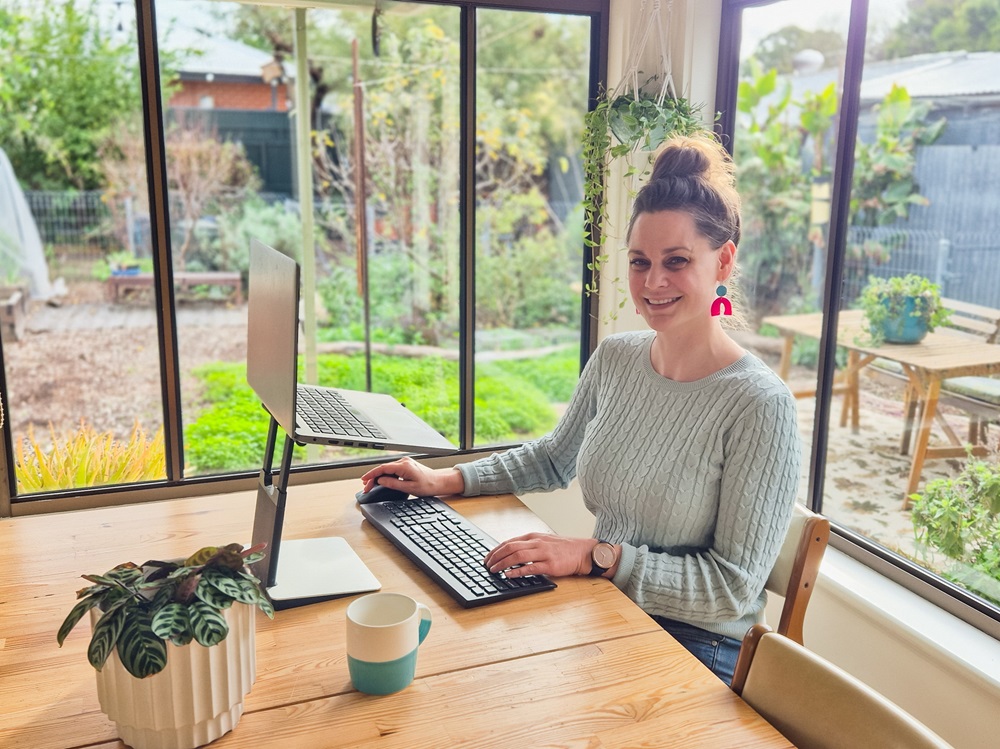 Koren Helbig working at home with her for-purpose ethical marketing clients.