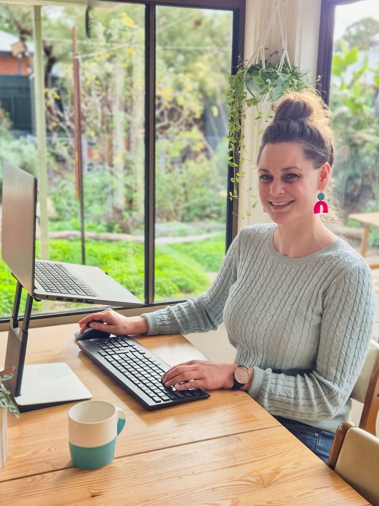 Permaculture Marketing Course founder Koren Helbig with her computer